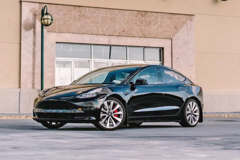 Rally Armor 17  Tesla Model 3 UR Black Mud Flap w/ Dark Grey Logo
